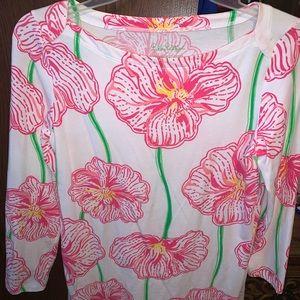 Lilly Pulitzer pink, white, and green floral top.